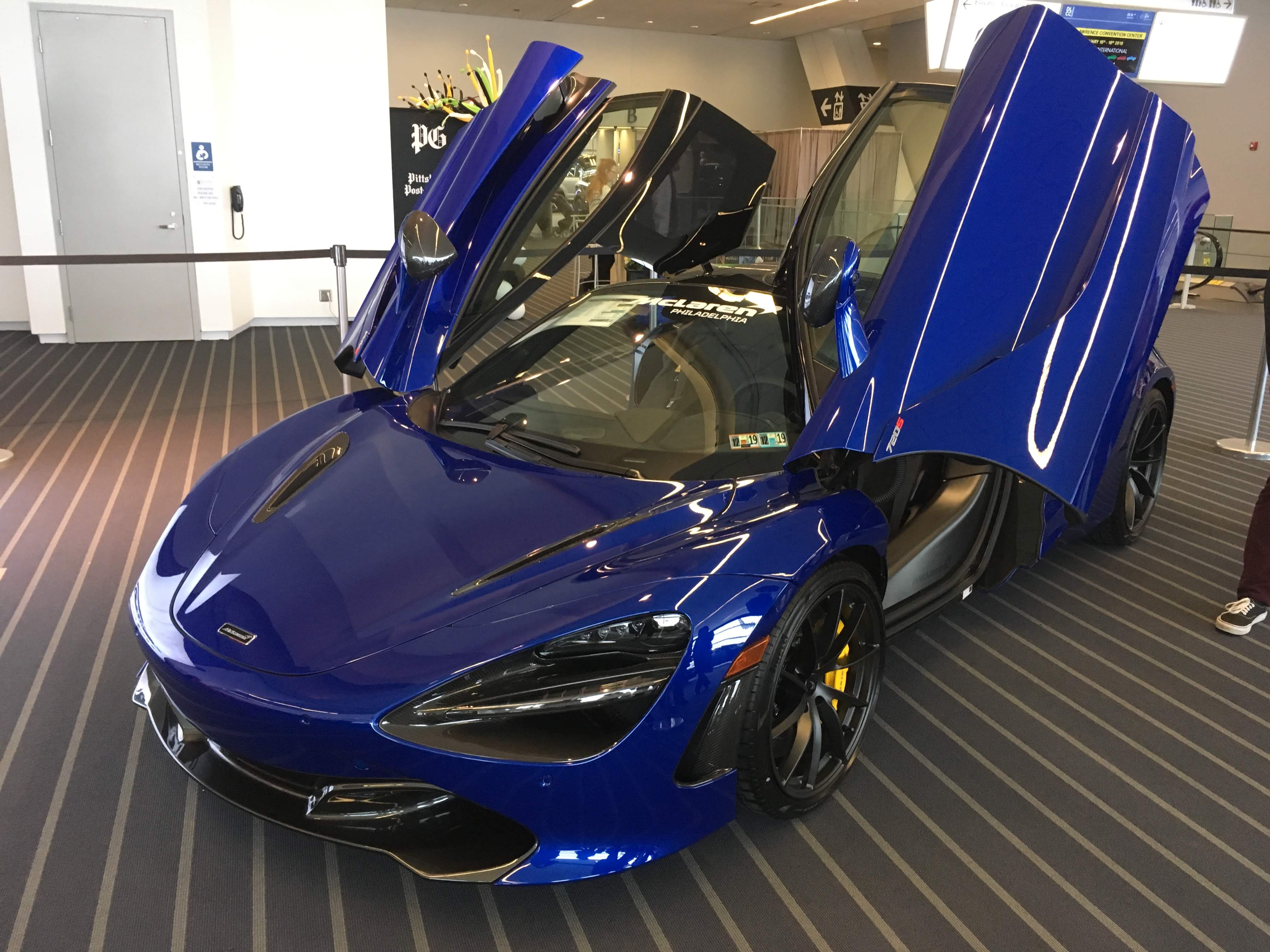 A blue Lotus sports car.