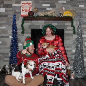 Gabe is pointing - Christmas photo - I'm smiling, Edie looks like she's going to take off and Arthur looks pissed.