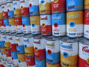 Meow Wolf, Omega Mart. Cans that look like Campbell's Soup put are 'Camel's Real Substitute' - they have names like 'Barely Barley' and 'Homestyle Pigeon'. Gross.